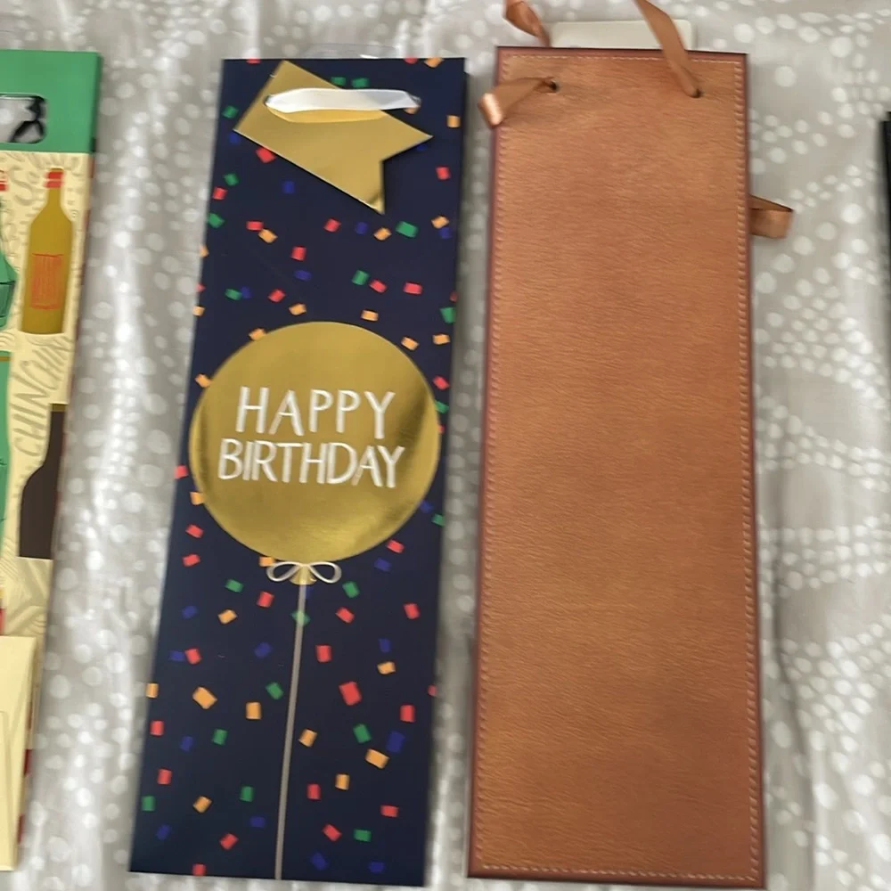 Set of 10 miscellaneous wine gift bags. Great for the upcoming holidays